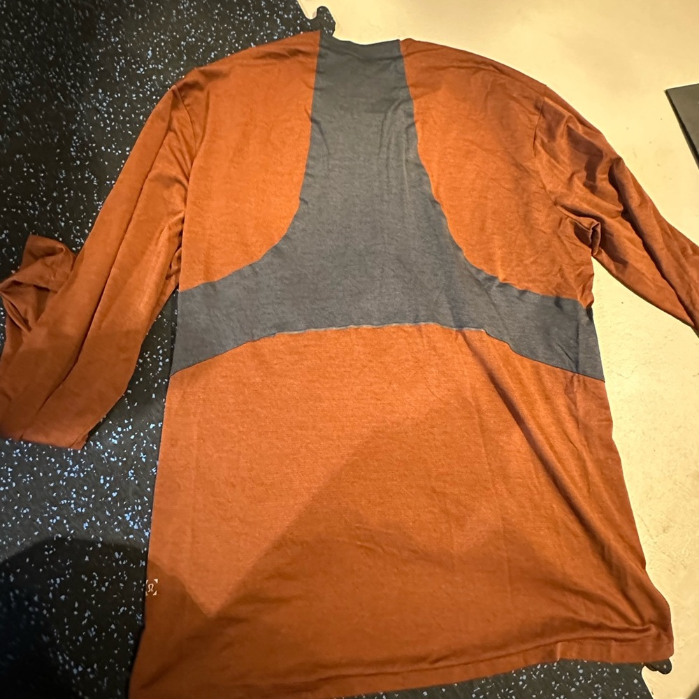 Orange men’s lululemon longsleeve shirt